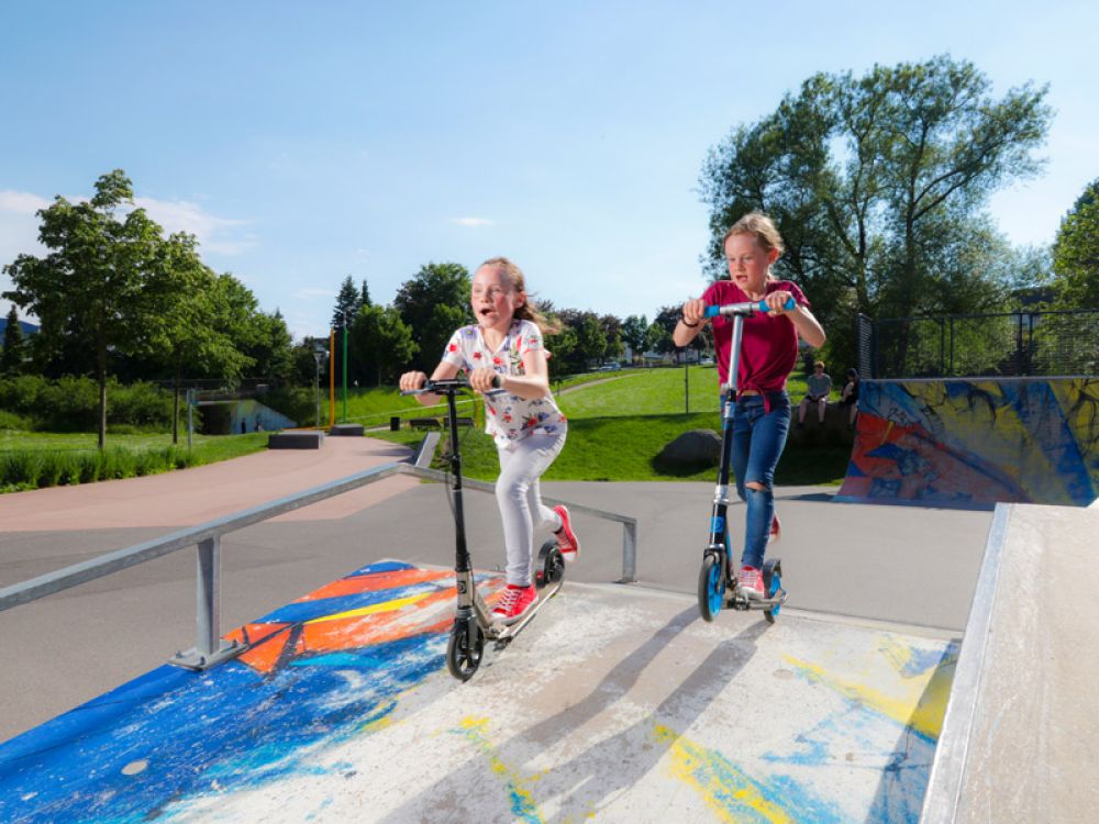 Kids on Scooters in the skatepark
